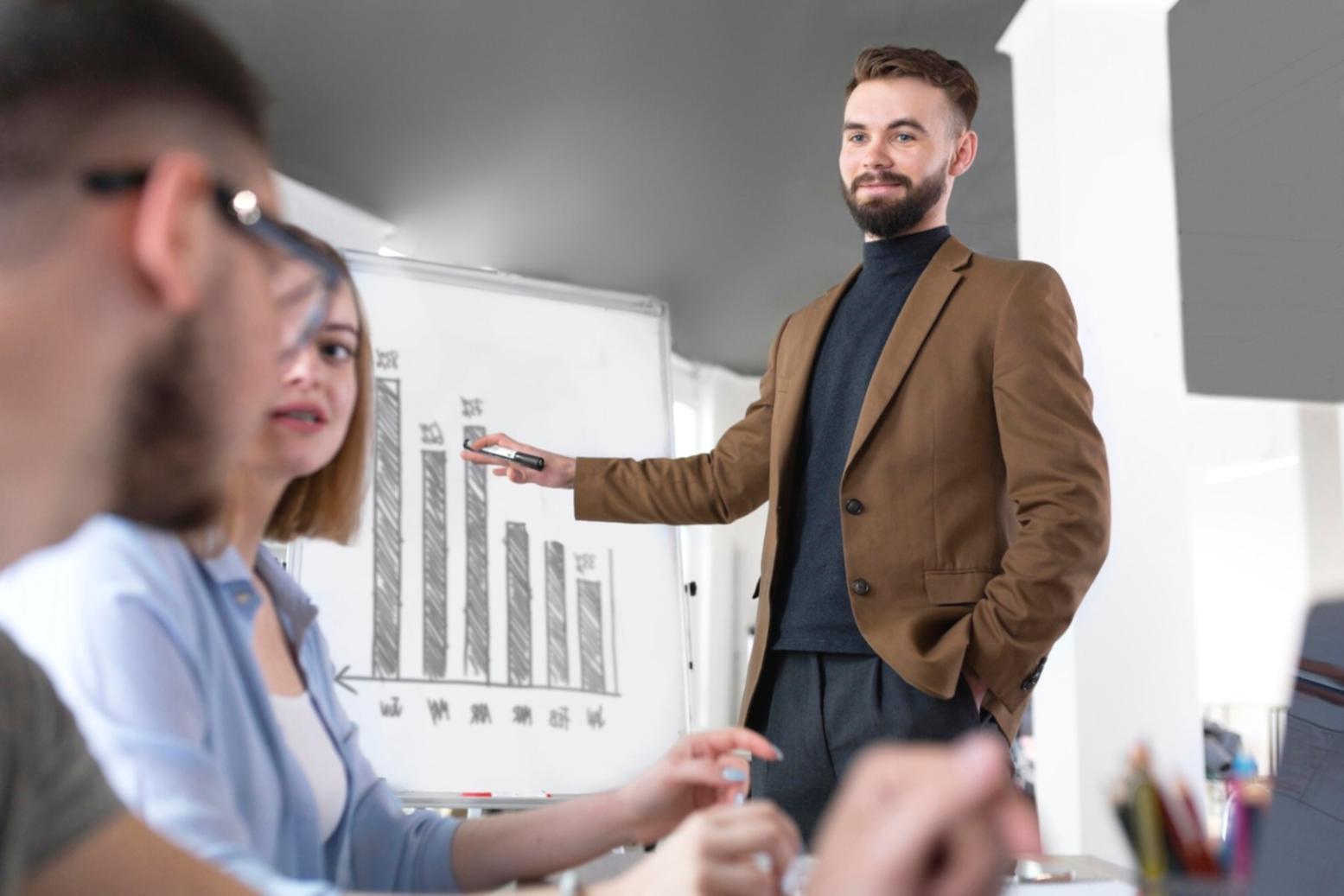 Professional training session with financial analysts reviewing valuation methodologies